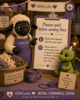 fibre prep A knitted sheep wearing a purple apron alongside a green dragon, surrounded by craft supplies.